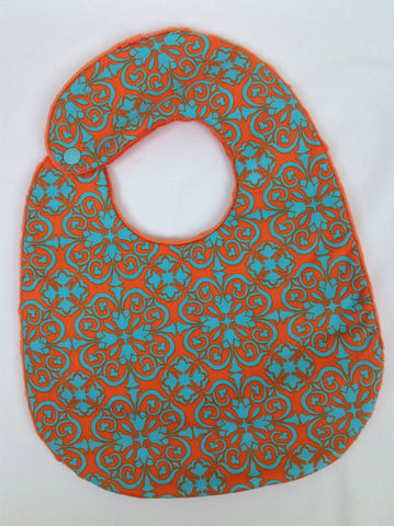 Orange and Aqua Scroll Bib